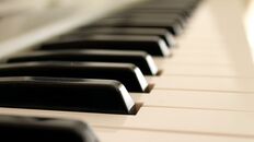 [photo: closeup of piano keys]